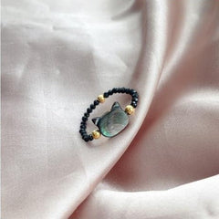 Lindos anillos de gato con cuentas de cristal