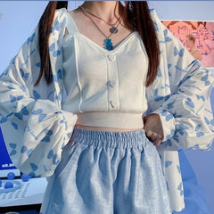 Top corto de punto con botones de corazón