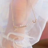 Collar de perlas, luna y estrella