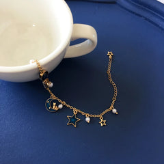 Pulsera de estrella y luna