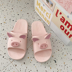 Lindas pantuflas de cerdito de dibujos animados
