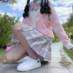 Abrigo de suéter con corazones