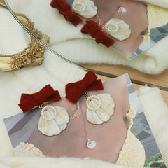 Pendientes de concha y perla en forma de corazón