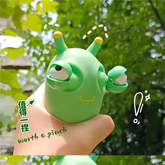 Juguete de descompresión de larvas verdes de ojos saltones