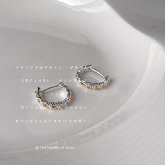 Hebillas pequeñas para orejas de margaritas redondas plateadas