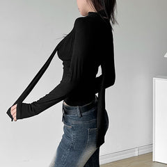 Top corto de manga larga con escote vuelto negro