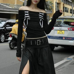 Top gótico negro de manga larga con hombros descubiertos