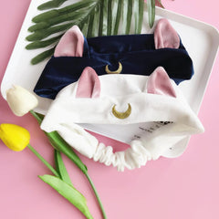 Diadema con orejas de gato en forma de media luna