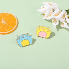 Pines creativos de ranas de dibujos animados