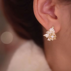 Pendientes de árbol de Navidad con copos de nieve giratorios