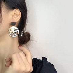 Pendientes de flores coloridas para niña