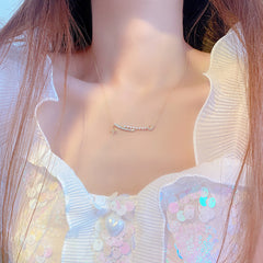 Collar de perlas, luna y estrella