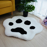 Bonita alfombra de peluche con forma de pata de gato