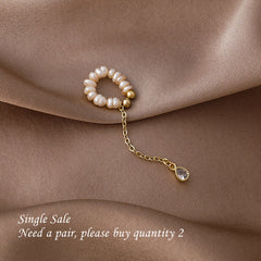 Puño de oreja con borla de perla de agua dulce