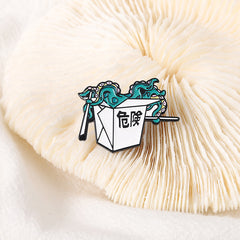 Broches de peligro de pulpo