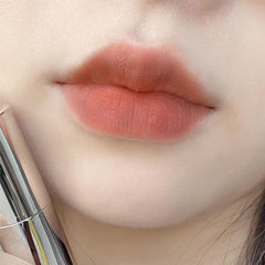 Brillo labial de corazón lindo