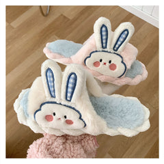 Lindas pantuflas de peluche con orejas de conejo