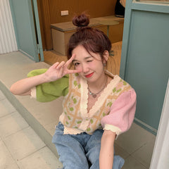 Cárdigan de punto con mangas abullonadas y bloques de color