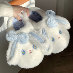 Lindas pantuflas de peluche de conejito