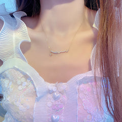 Collar de perlas, luna y estrella