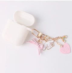 Lindo llavero de cachorro arcoíris