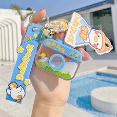 Llavero flotante con cámara de arenas movedizas de la serie Dake Duck