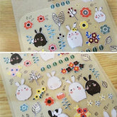 Pegatina de conejito de flores