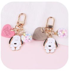 Llavero con forma de perro y bola de colores en forma de corazón