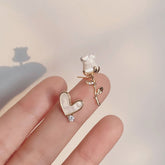 Pendientes vintage franceses de rosa blanca
