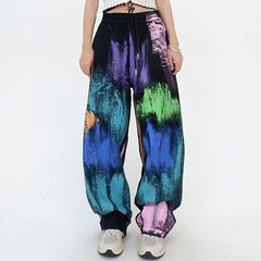 Pantalones holgados con efecto tie-dye gótico bohemio