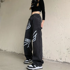 Vaqueros de cintura alta con diseño de mano de esqueleto gótico grunge