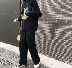 Conjunto de 2 piezas con suéter de dibujos animados, pantalones largos acampanados, falda y traje negro