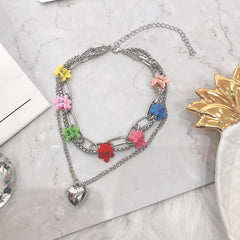 Collar de cadena plateada con horquilla de flor pequeña para niños de los años 90