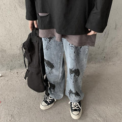 Vaqueros azules holgados con estampado de caras de anime y estética Tumblr