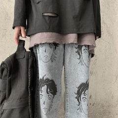 Vaqueros azules holgados con estampado de caras de anime y estética Tumblr