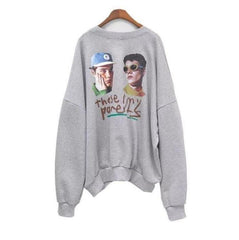 Sudadera holgada con cuello redondo y estampado en la espalda