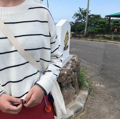 Suéter de punto plano con colores básicos