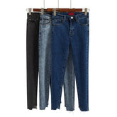 Vaqueros básicos Skynny con corte rasgado en los tobillos