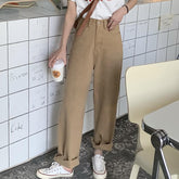 Pantalones holgados de cintura alta con estética beige para chica