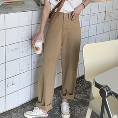 Pantalones holgados de cintura alta con estética beige para chica