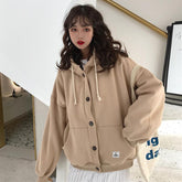 Suéter holgado con capucha y botones beige