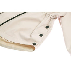 Chaqueta cortavientos beige con capucha y cintura elástica