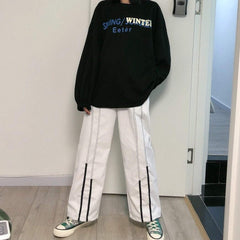 Pantalones negros de cintura alta con elástico extragrande