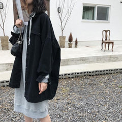 Chaqueta vaquera estilo camisa larga color beige y negro