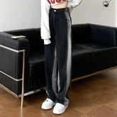 Vaqueros rectos lavados con estética grunge negra