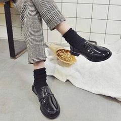 Mocasines de piel sintética negra mate