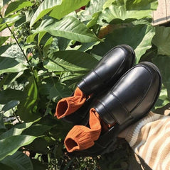 Mocasines de piel sintética negra mate