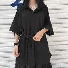Blusa kimono minimalista negra de manga corta