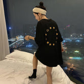 Camiseta extragrande con estampado de estrellas rosas y negras