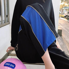 Pantalones deportivos anchos y holgados con cremallera lateral negra
